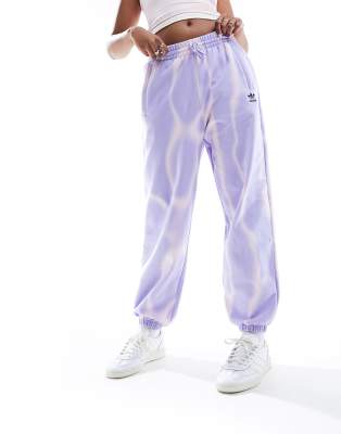 adidas Originals Dye allover print joggers in purple