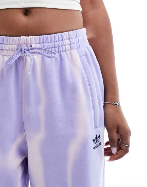 adidas Originals Dye allover print joggers in purple