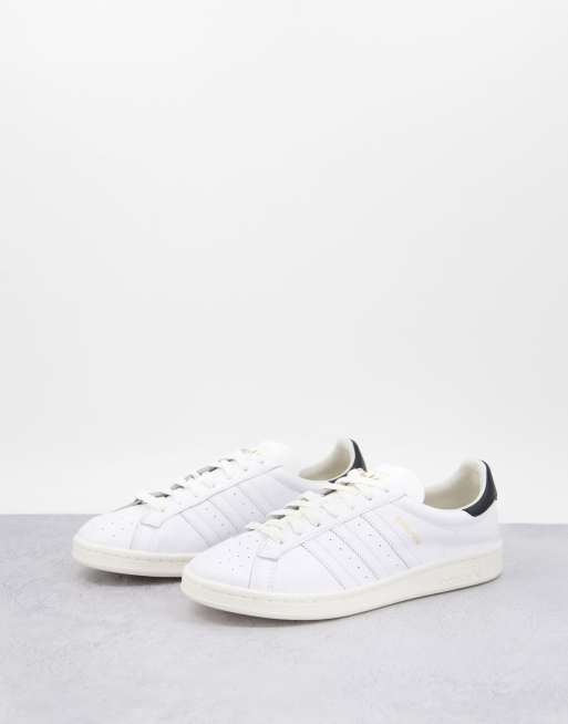adidas Originals - Earlham - Sneakers in wit met zwart hielstuk