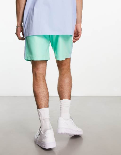 adidas Originals Enjoy Summer graphic shorts in pastel mint