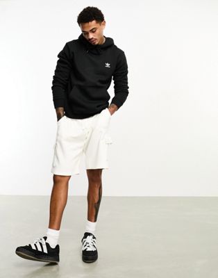 adidas Originals essential hoodie with mini chest logo in black - ASOS Price Checker