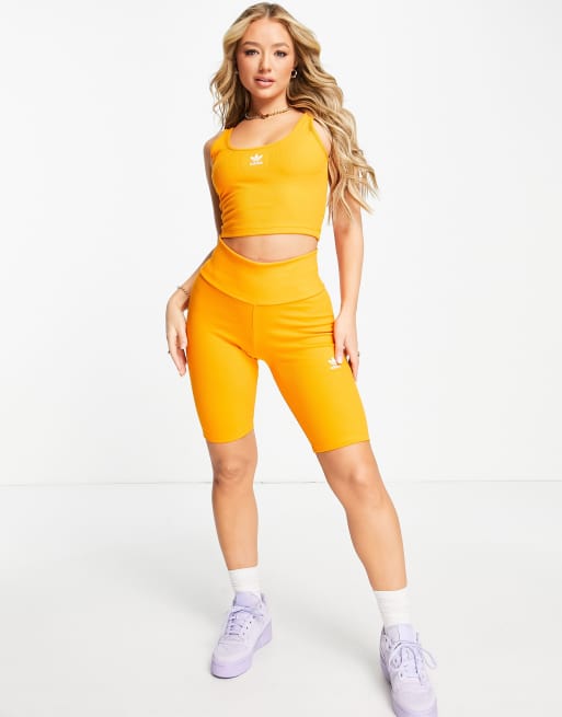 adidas Originals essential legging shorts with logo in orange