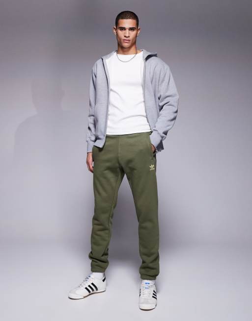 Adidas track pants with zip pockets online