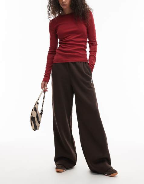 adidas Originals essential wide leg trackies in brown - view 1