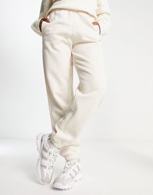 adidas Originals essentials fleece joggers in off white