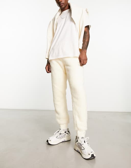 adidas Originals Essentials+ fluffy joggers in off-white