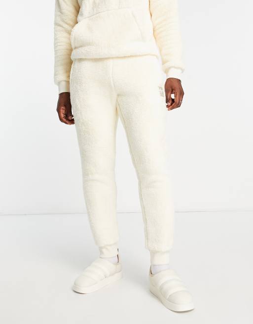 adidas originals Essentials+ fluffy joggers in wonder white