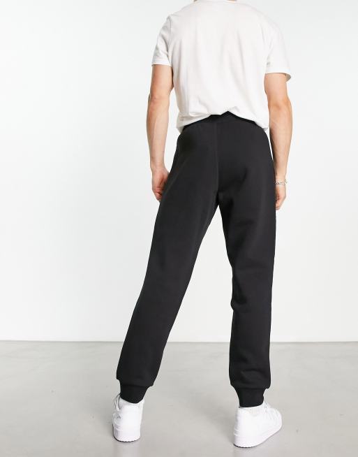 https://images.asos-media.com/products/adidas-originals-essentials-joggers-in-black/203987382-2?$n_640w$&wid=513&fit=constrain