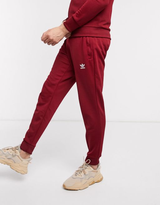 adidas Originals essentials joggers trefoil logo in burgundy | ASOS