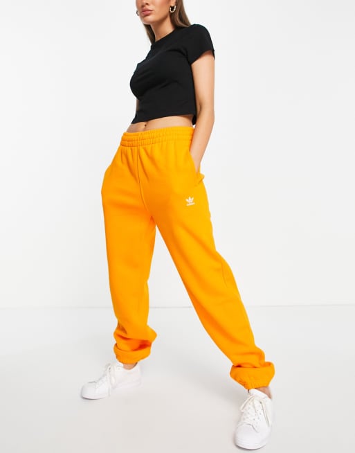 Orange adidas deals track pants