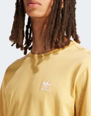 adidas Originals Essentials left chest logo t-shirt in yellow | ASOS
