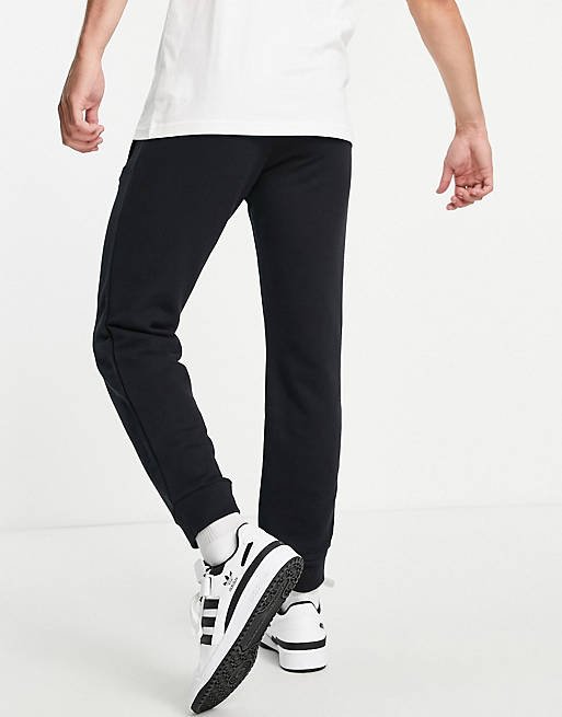 Tracksuits adidas Originals Essentials logo joggers in black 