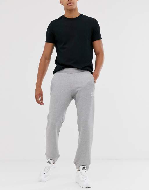 Adidas originals logo on sale joggers in grey