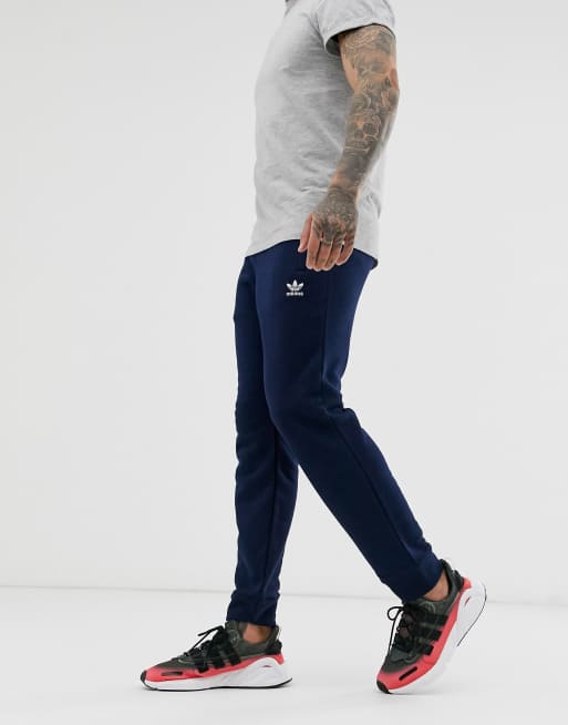 adidas Originals Essentials logo trackies in navy ASOS