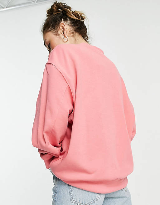 Hoodies & Sweatshirts adidas Originals essentials oversized central logo sweatshirt in pink 