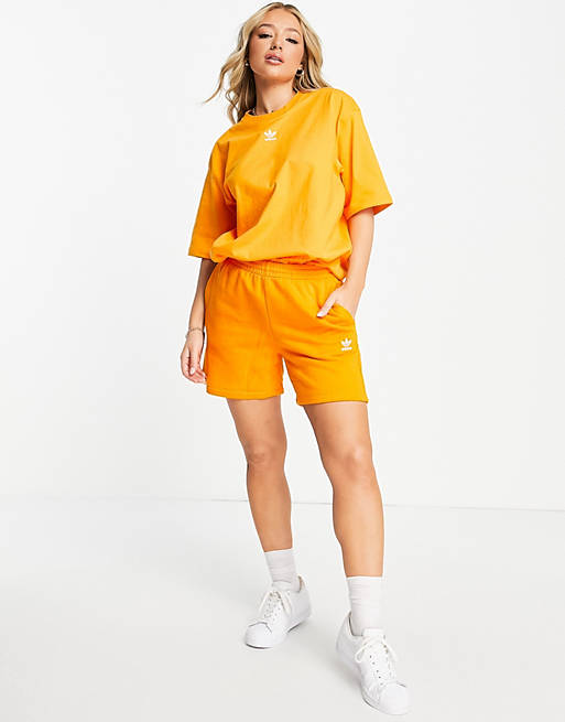 adidas Originals essentials shorts with logo in orange