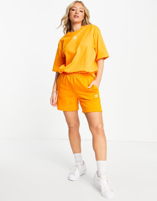 adidas Originals essentials shorts with logo in orange