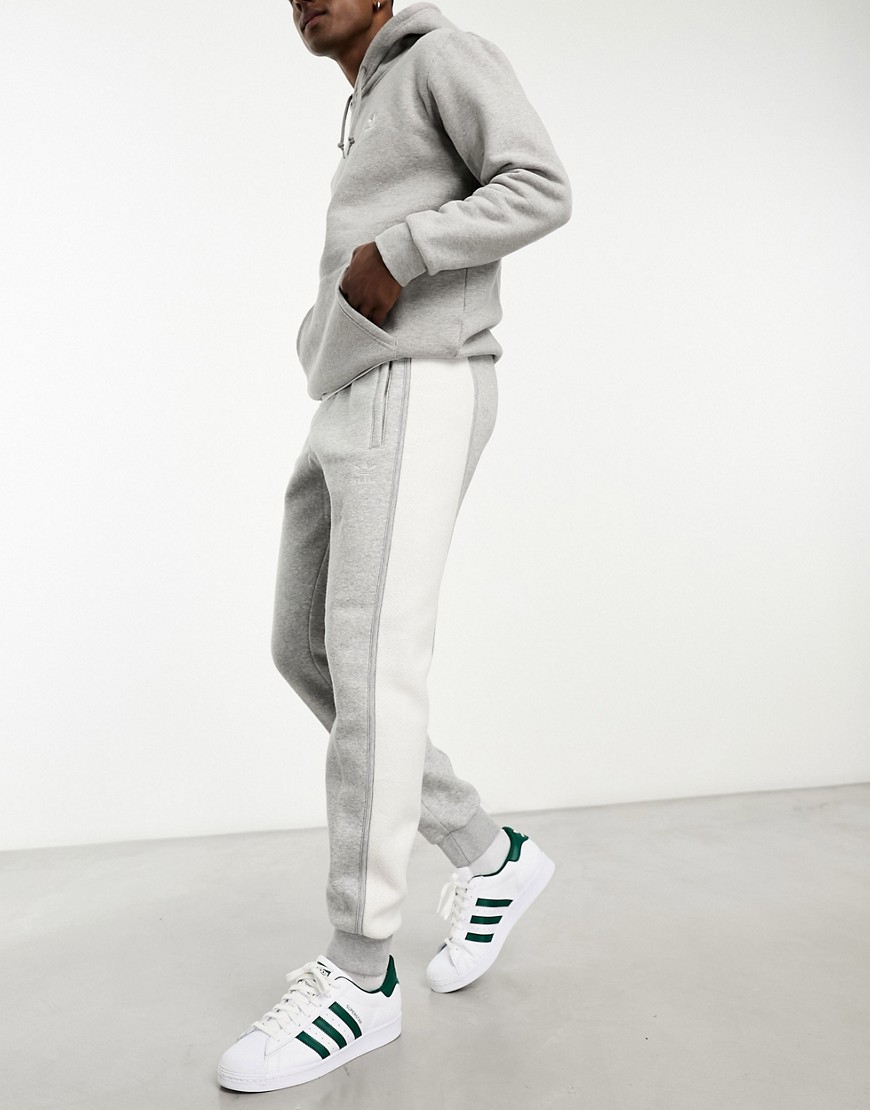 adidas Originals Essentials+ small logo cut and sew joggers in grey marl