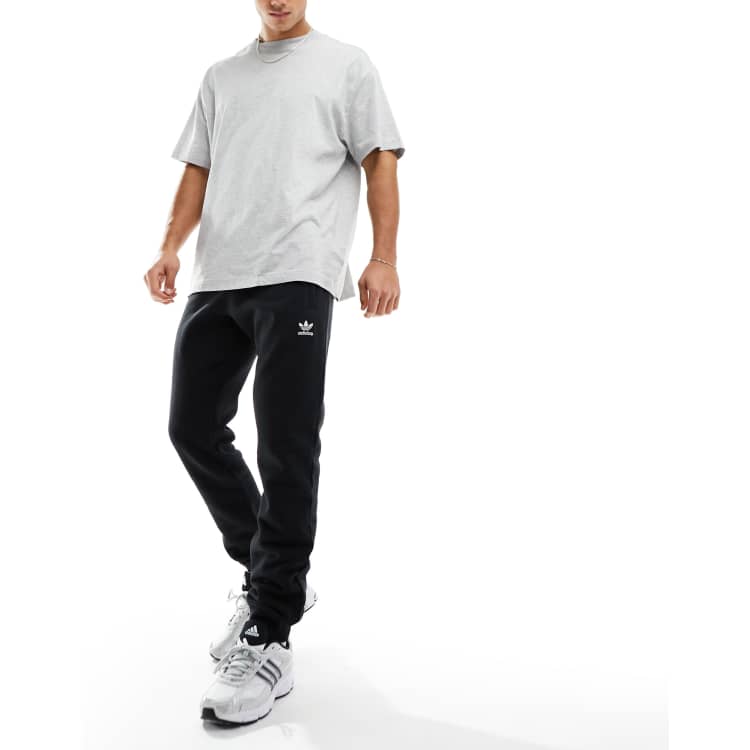 adidas Men's Essentials 3-Stripe Wind Pants, Black/Black/Black, Small :  : Clothing, Shoes & Accessories