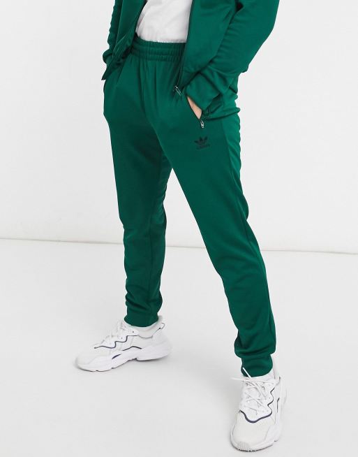 adidas Originals essentials trefoil logo tracksuit in dark green