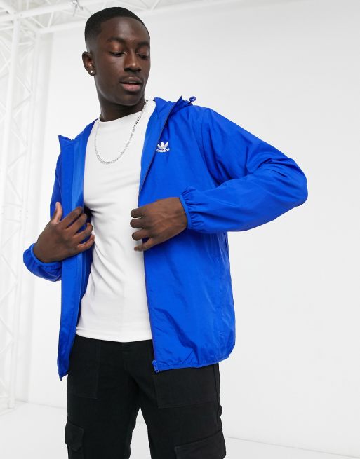 adidas Originals essentials trefoil windbreaker jacket in blue