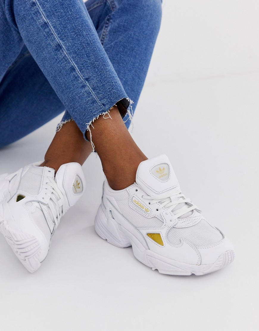 Adidas Originals Falcon trainers in white and gold