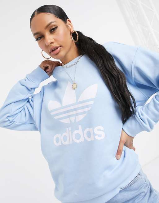 Felpa adidas azzurra store e bianca