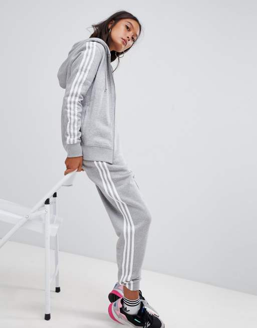 Felpa adidas grigia store e bianca