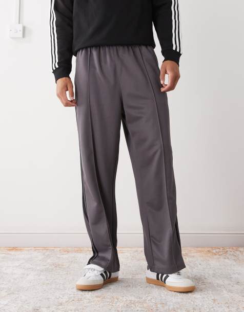 adidas Originals Firebird baggy fit track pants in grey and black - view 1