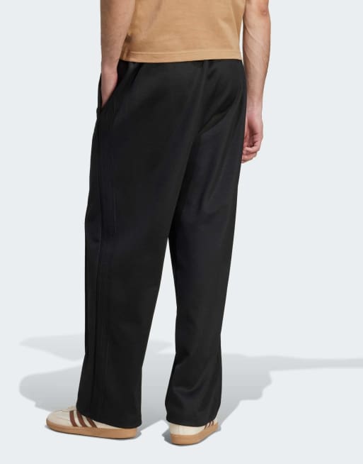 adidas Originals Firebird baggy track pants in black