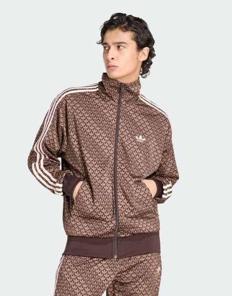 adidas Originals – Firebird – Brązowo-różowa, luźna kurtka dresowa we wzór w monogramy - view 1