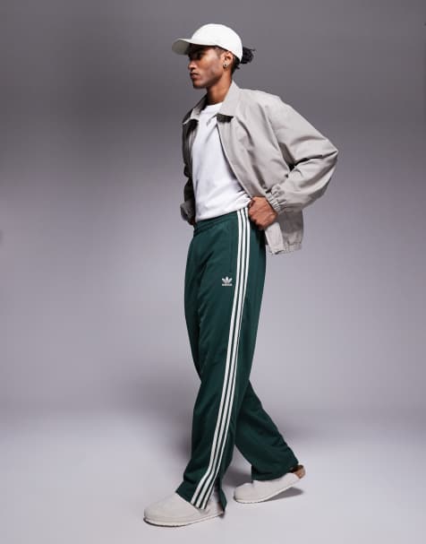 adidas Originals Firebird track pants in dark green 