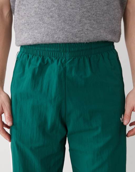 adidas Originals – Firebird – Gewebte Trainingshose in Collegiate Green, 4 von 5