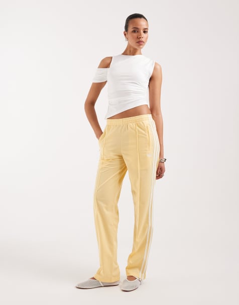 adidas Originals - Firebird - Klassieke trainingsbroek in geel en wit - view 1