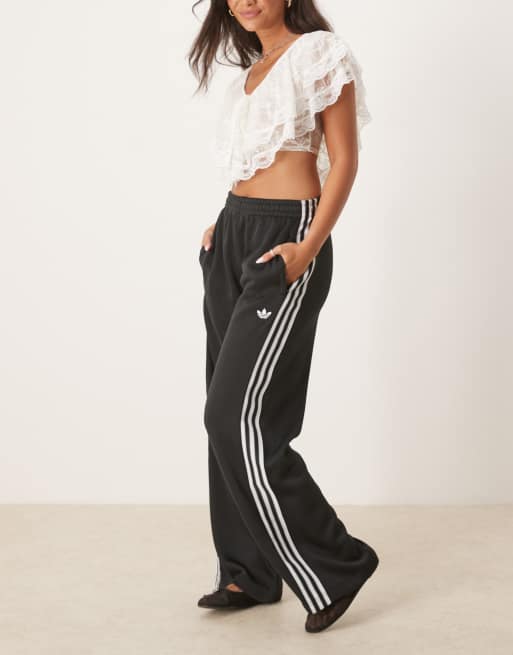 adidas Originals Firebird knitted track pants in black | ASOS