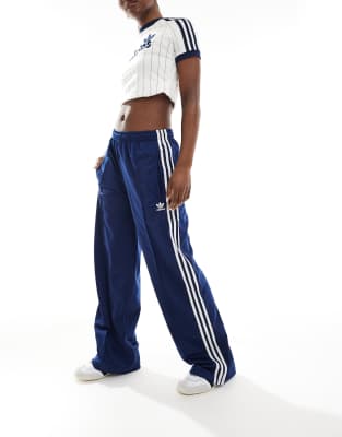 adidas Originals - Firebird - Locker sitzende Trainingshose in Marineblau