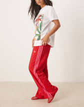 adidas Originals - Firebird - Locker sitzende Trainingshose in Rot und Rosa