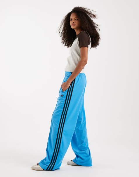 adidas Originals – Firebird – Lockere Trainingshose in Blau und Braun - view 1