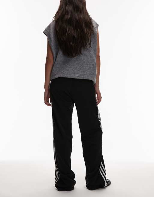 adidas Originals – Firebird – Lockere Trainingshose in Schwarz und Weiß, 3 von 5
