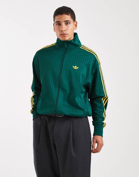adidas Originals – Firebird – Lockere Trainingsjacke in Collegiate Grün mit Nadelstreifen - view 1
