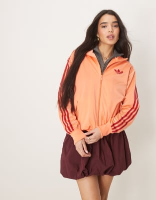 adidas Originals - Firebird Loose - Locker sitzende Trainingsjacke in Orange und Rot-Rosa