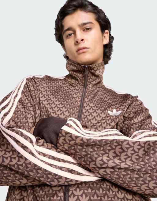adidas Originals Firebird loose monogram track top in coffee brown