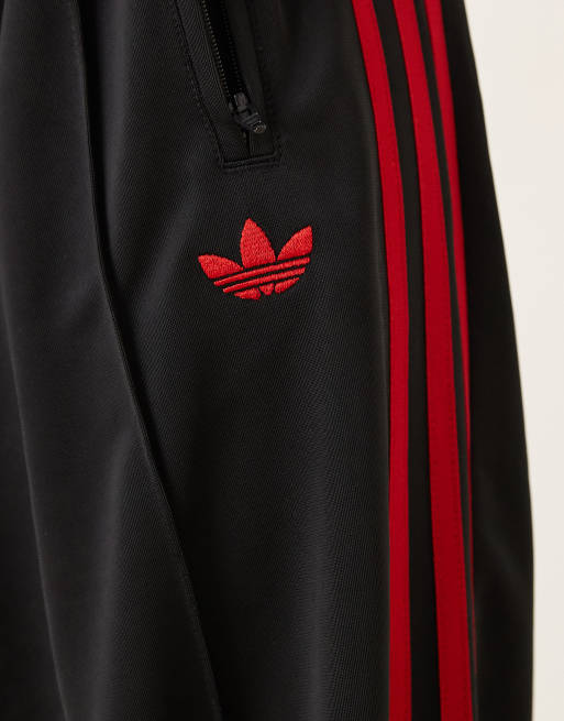 adidas Originals Firebird Loose track pants in black and red