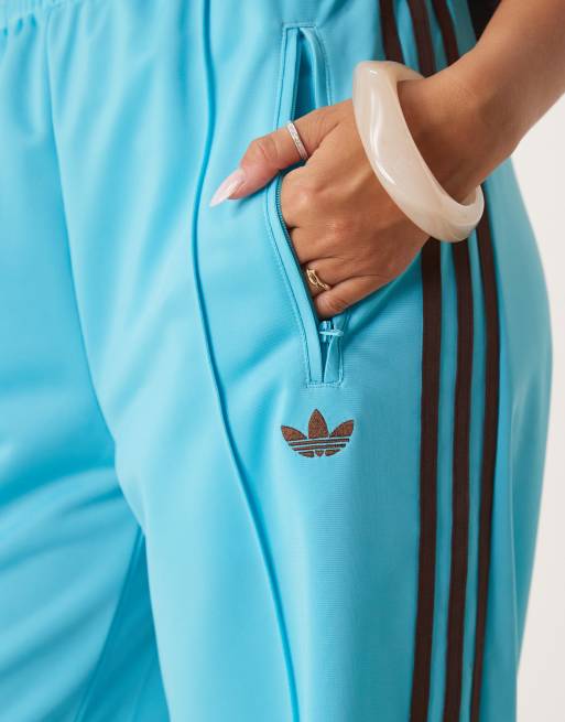 adidas Originals Firebird Loose track pants in blue and brown