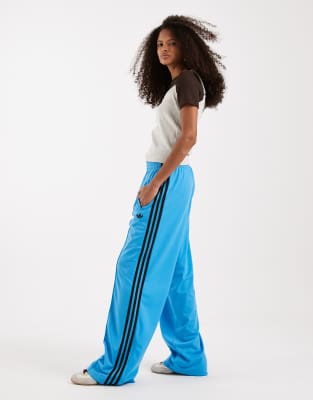 adidas Originals Firebird Loose track pants in blue and brown