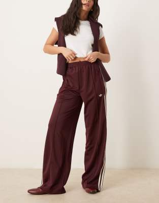 adidas Originals Firebird Loose track pants in burgundy