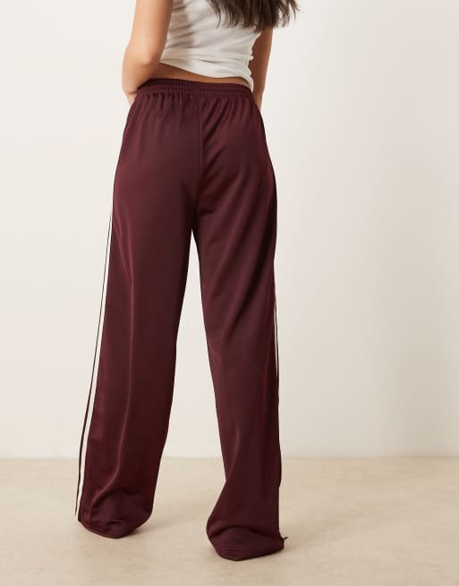 adidas Originals Firebird Loose track pants in burgundy