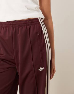 adidas Originals Firebird Loose track pants in burgundy