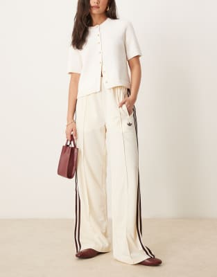 adidas Originals Firebird Loose track pants in cream and burgundy | ASOS