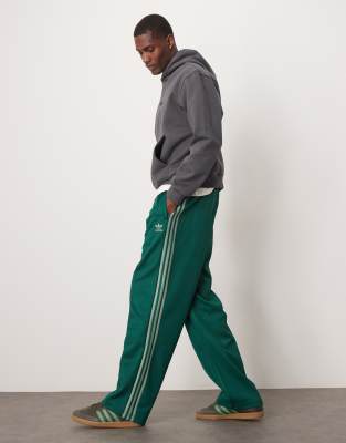 adidas Originals Firebird loose track pants in green - view 1